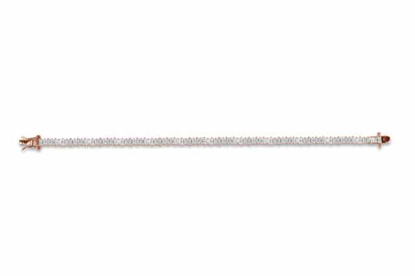 Bracelet rivière Marylin en argent rhodié rose 925/1000, serti de baguettes cubics zirconiums d’environ 3 mm. Orligne Genève B1394RW